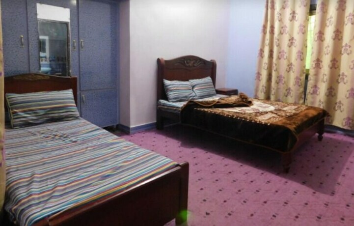 Imagen de la habitación del Hotel Pine Breeze And Restaurant. Foto 18