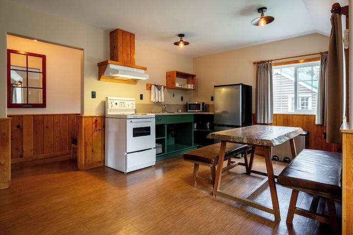 Imagen de la habitación del Hotel Pine Bungalows. Foto 9