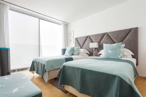 Imagen de la habitación del Hotel Pine Cliffs Village & Golf Suites. Foto 8