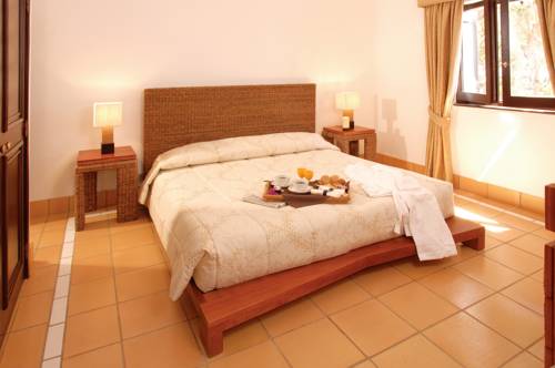 Imagen de la habitación del Hotel Pine Cliffs Village & Golf Suites. Foto 10