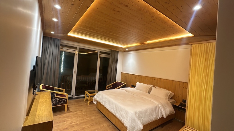 Imagen de la habitación del Hotel Pine Heritage. Foto 9