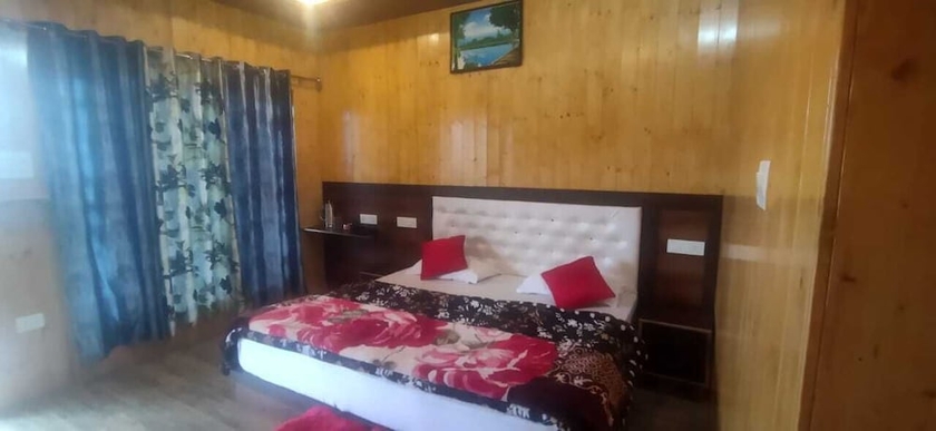 Imagen de la habitación del Hotel Pine Palace Homestay. Foto 2
