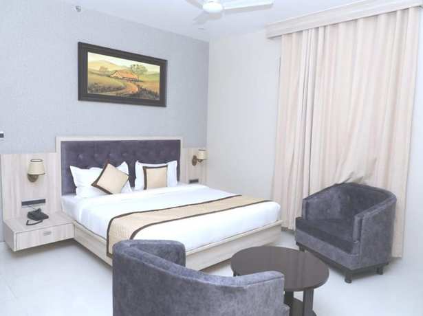 Imagen de la habitación del Hotel Pine Regency - Aravali\'s Peak view. Foto 3