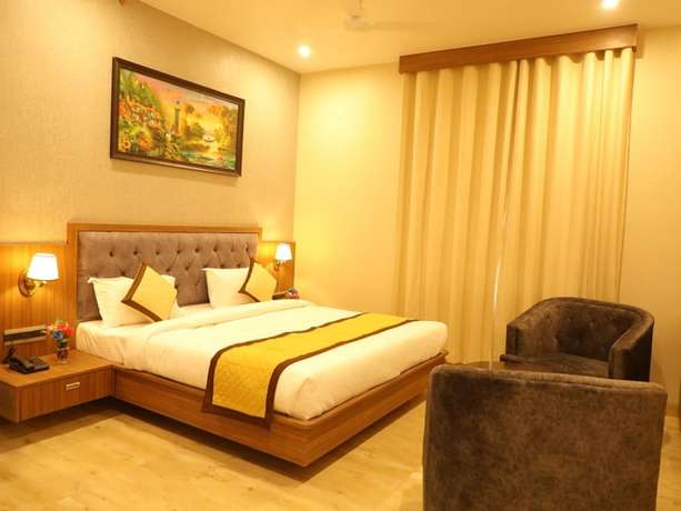 Imagen de la habitación del Hotel Pine Regency - Aravali\'s Peak view. Foto 4