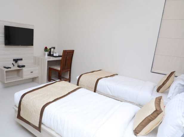Imagen de la habitación del Hotel Pine Regency - Aravali\'s Peak view. Foto 11
