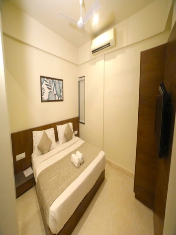 Imagen de la habitación del Hotel Pine Tree, Rajkot. Foto 4