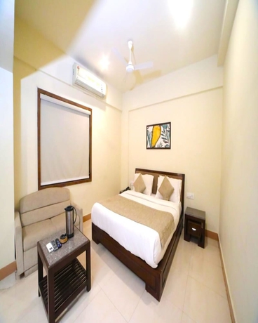 Imagen de la habitación del Hotel Pine Tree, Rajkot. Foto 5