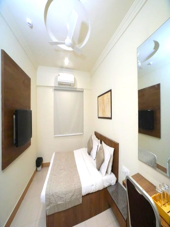 Imagen de la habitación del Hotel Pine Tree, Rajkot. Foto 6