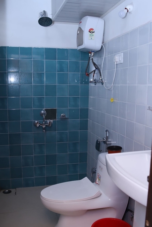 Imagen de la habitación del Hotel Pine Tree, Rajkot. Foto 9