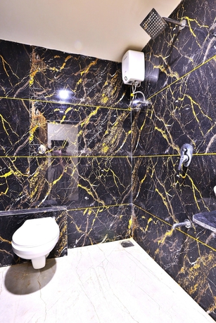 Imagen de la habitación del Hotel Pine Tree, Rajkot. Foto 11