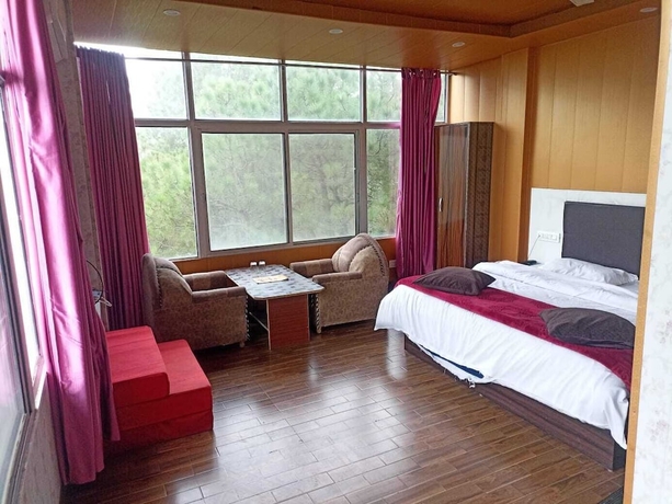 Imagen de la habitación del Hotel Pine View Villa. Foto 2
