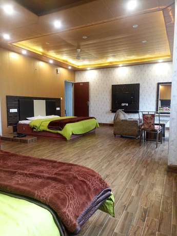 Imagen de la habitación del Hotel Pine View Villa. Foto 11