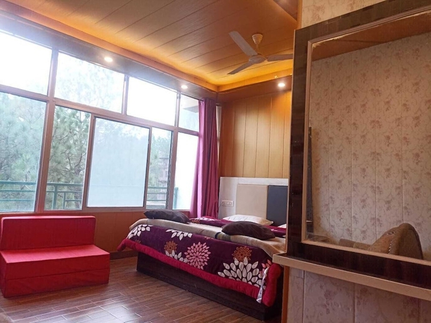 Imagen de la habitación del Hotel Pine View Villa. Foto 12