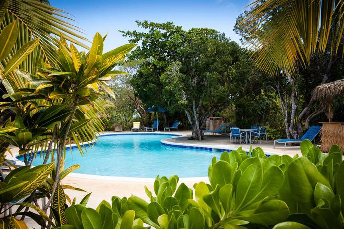 Imagen de la piscina del Hotel Pineapple Fields Resort. Foto 8