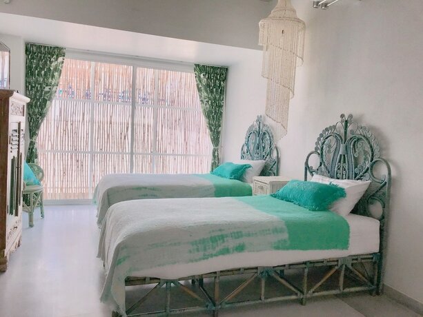 Imagen de la habitación del Hotel Pineapple Lazy Beach Villa. Foto 19