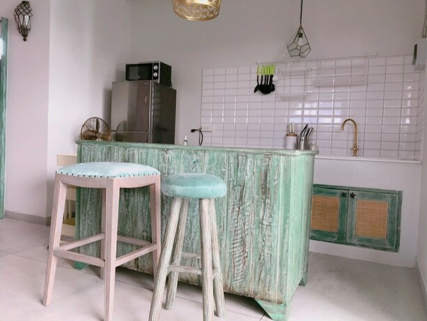 Imagen de la habitación del Hotel Pineapple Lazy Beach Villa. Foto 22