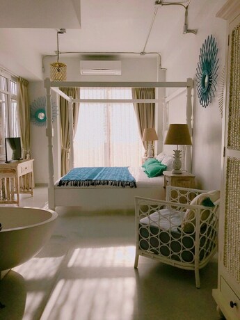 Imagen de la habitación del Hotel Pineapple Lazy Beach Villa. Foto 24
