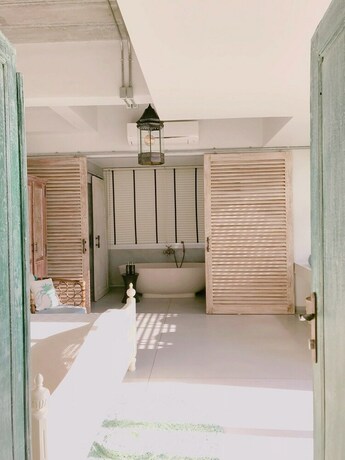 Imagen de la habitación del Hotel Pineapple Lazy Beach Villa. Foto 29