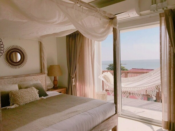 Imagen de la habitación del Hotel Pineapple Lazy Beach Villa. Foto 36