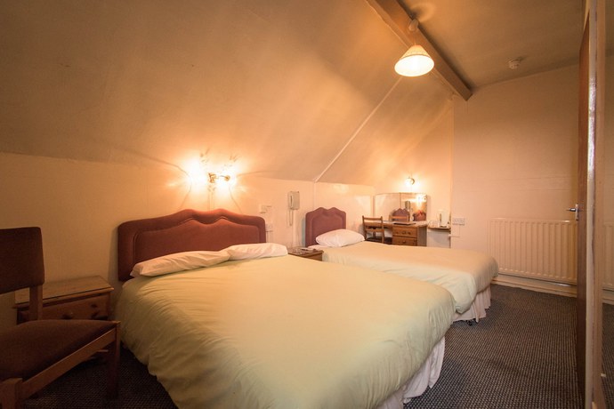 Imagen de la habitación del Hotel Pinegrove. Foto 11