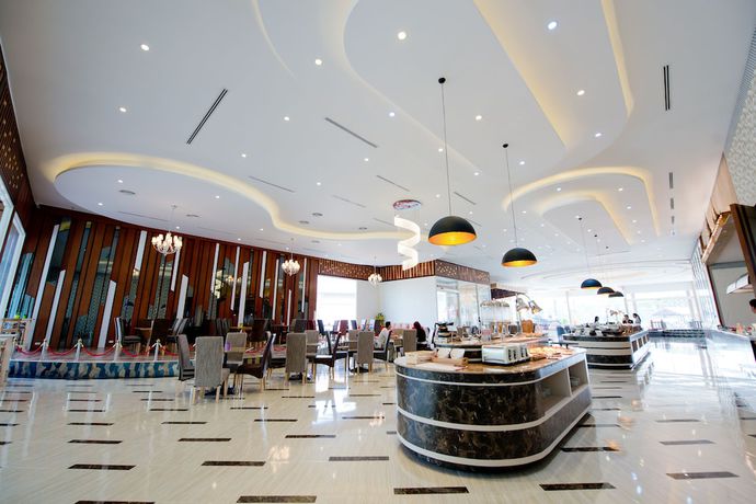 Imagen del bar/restaurante del Hotel Pinehurst Golf Club and Hotel, Khlong Luang. Foto 9