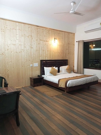 Imagen de la habitación del Hotel Pineland Chalets And Resort. Foto 2