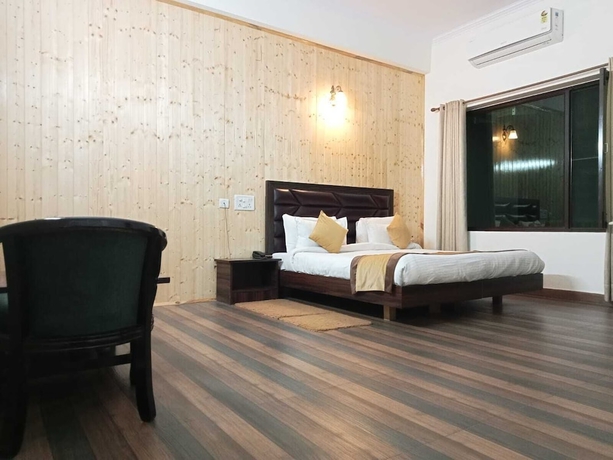 Imagen de la habitación del Hotel Pineland Chalets And Resort. Foto 3