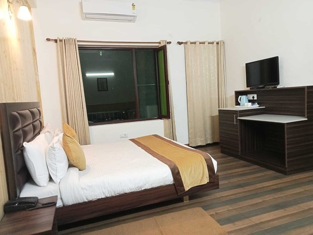 Imagen de la habitación del Hotel Pineland Chalets And Resort. Foto 4
