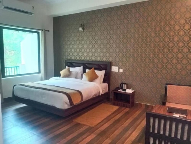 Imagen de la habitación del Hotel Pineland Chalets And Resort. Foto 5