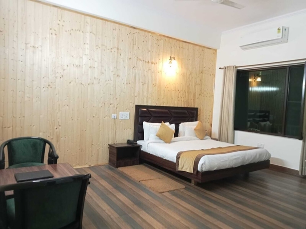 Imagen de la habitación del Hotel Pineland Chalets And Resort. Foto 6