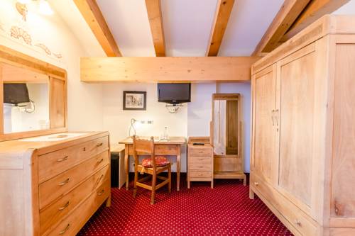 Imagen de la habitación del Hotel Pineta Pastry. Foto 8