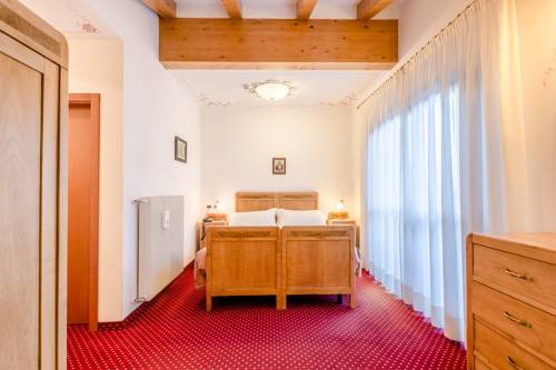 Imagen de la habitación del Hotel Pineta Pastry. Foto 9