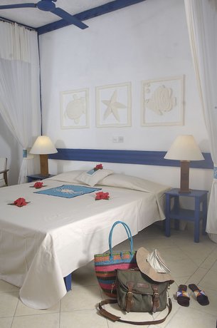 Imagen de la habitación del Hotel Pinewood Beach Resort And Spa. Foto 9
