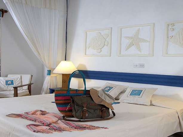 Imagen de la habitación del Hotel Pinewood Beach Resort And Spa. Foto 16