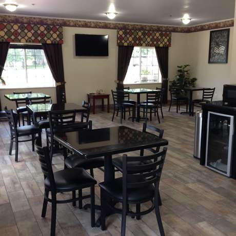 Imagen del bar/restaurante del Hotel Piney Woods. Foto 4