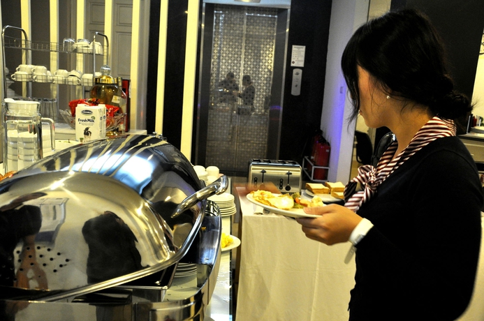 Imagen del bar/restaurante del Hotel Ping Hanoi. Foto 5