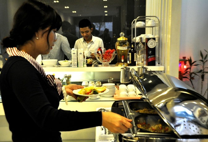 Imagen del bar/restaurante del Hotel Ping Hanoi. Foto 7