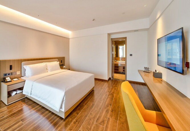 Imagen de la habitación del Hotel Ping Yue Guo Ji Jiu Dian. Foto 8