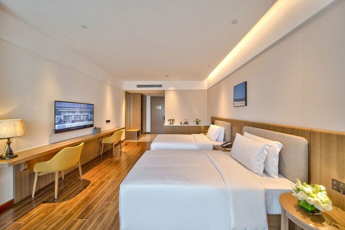 Imagen de la habitación del Hotel Ping Yue Guo Ji Jiu Dian. Foto 9