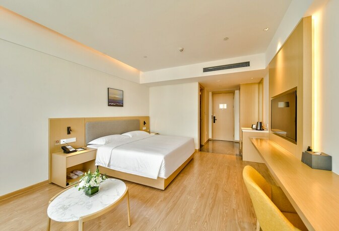 Imagen de la habitación del Hotel Ping Yue Guo Ji Jiu Dian. Foto 10