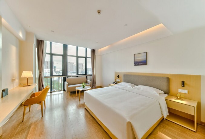 Imagen de la habitación del Hotel Ping Yue Guo Ji Jiu Dian. Foto 11