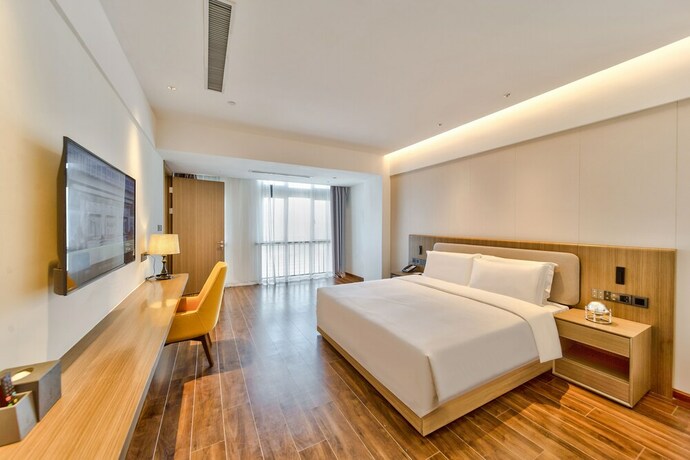 Imagen de la habitación del Hotel Ping Yue Guo Ji Jiu Dian. Foto 12