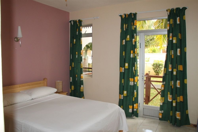 Imagen de la habitación del Hotel Pingouinvillas. Foto 4