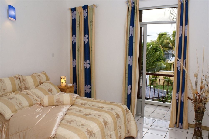 Imagen de la habitación del Hotel Pingouinvillas. Foto 5