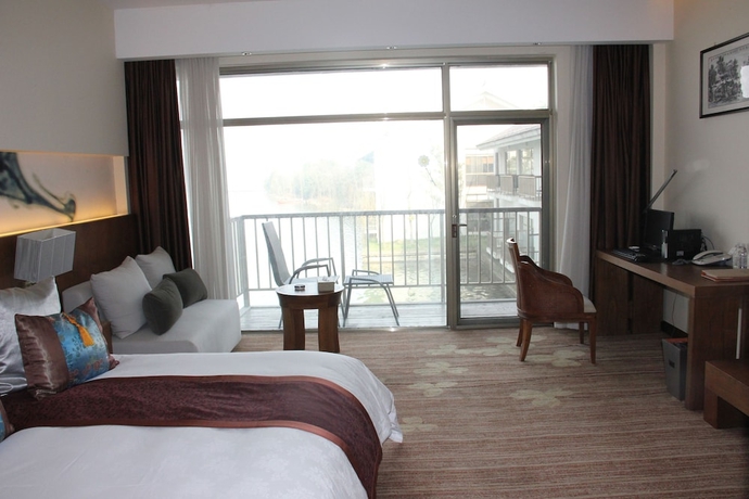 Imagen de la habitación del Hotel Pingtian Peninsula. Foto 4