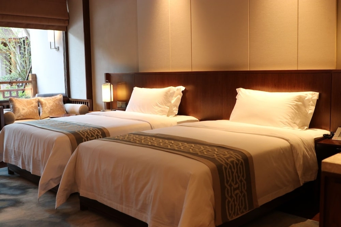 Imagen de la habitación del Hotel Pingtian Peninsula. Foto 11