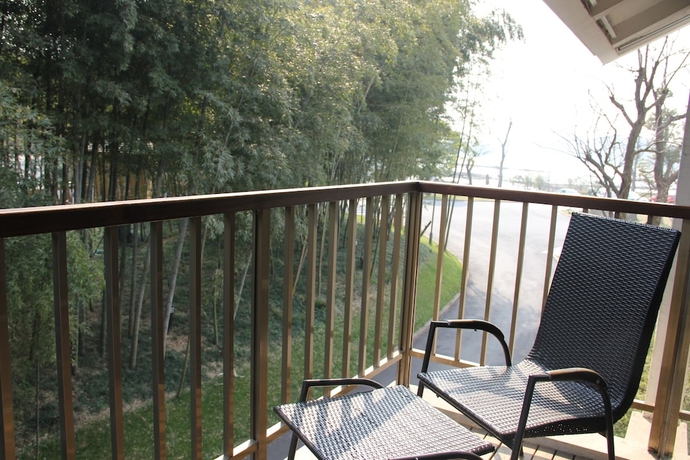 Imagen de la habitación del Hotel Pingtian Peninsula. Foto 12