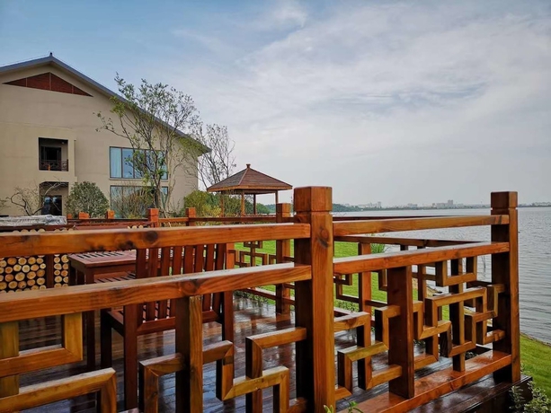 Imagen de la habitación del Hotel Pingtian Peninsula. Foto 14