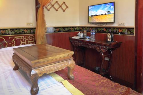 Imagen de la habitación del Hotel Pingyao Cheng Jia. Foto 9