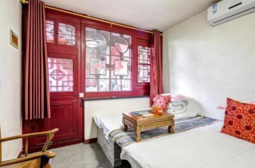 Imagen de la habitación del Hotel Pingyao Dechang Folks Inn. Foto 9
